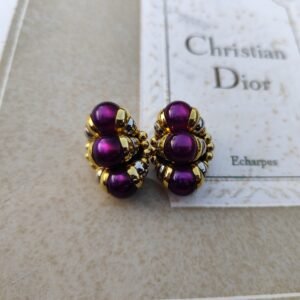 Clips doré et violet